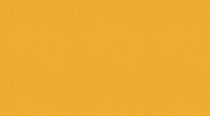 A close-up of a textured yellow background.