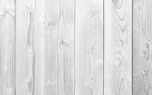 A white wooden background with white planks, perfect for The Lime Foundation's new promotional materials.