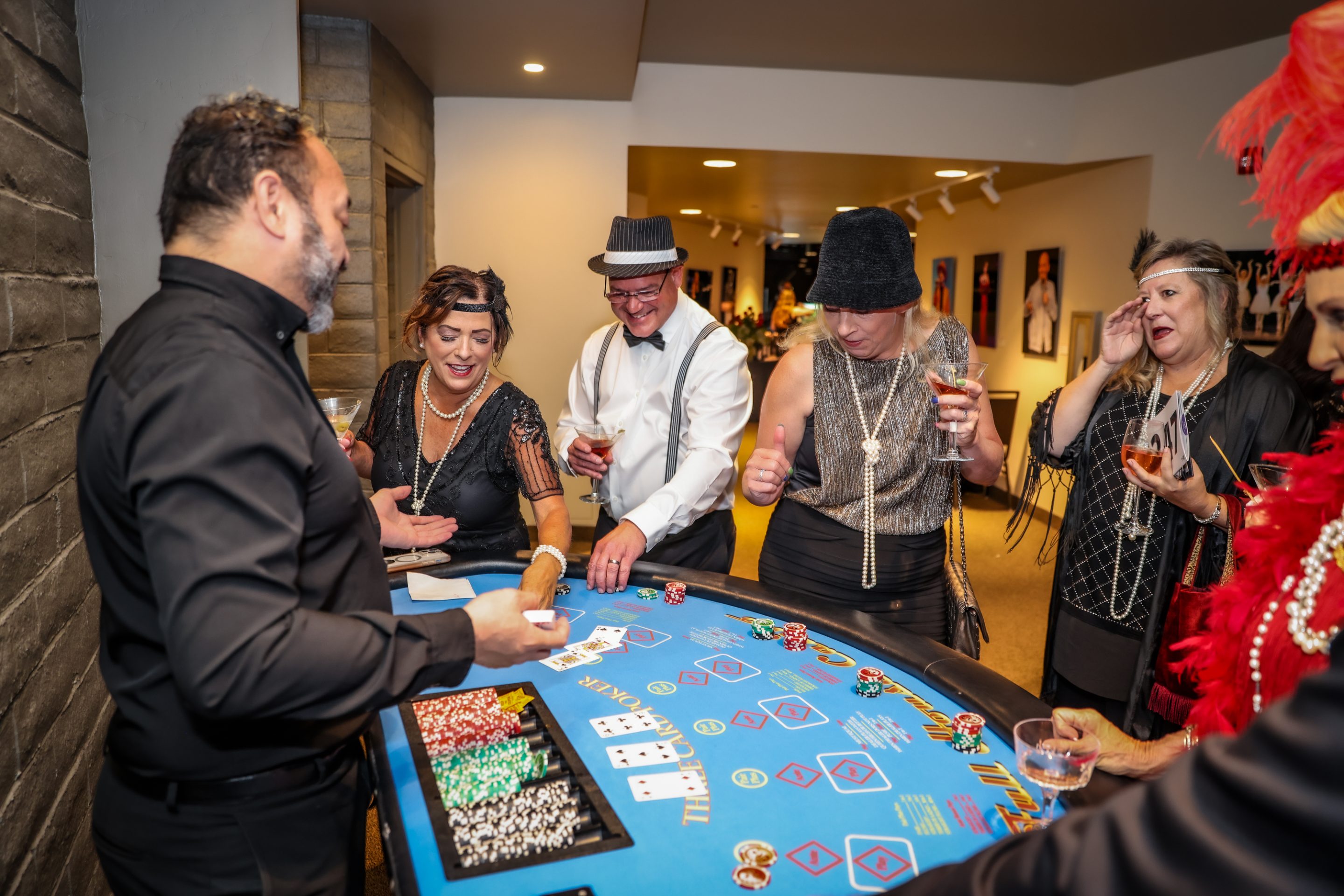A group of people playing baccarat at a Sonoma County non-profit organization event.