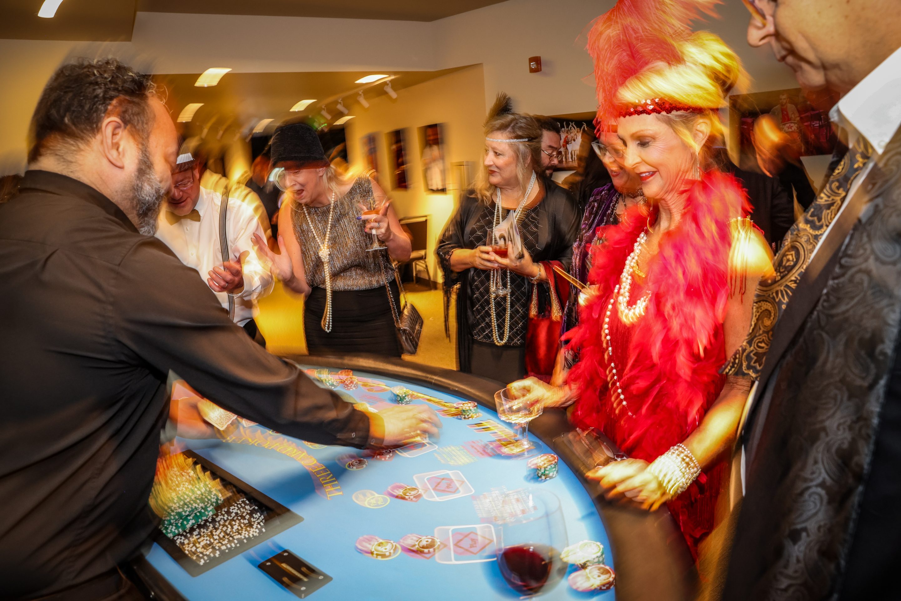 A group of people playing a game of roule at a Sonoma County non-profit organization event.