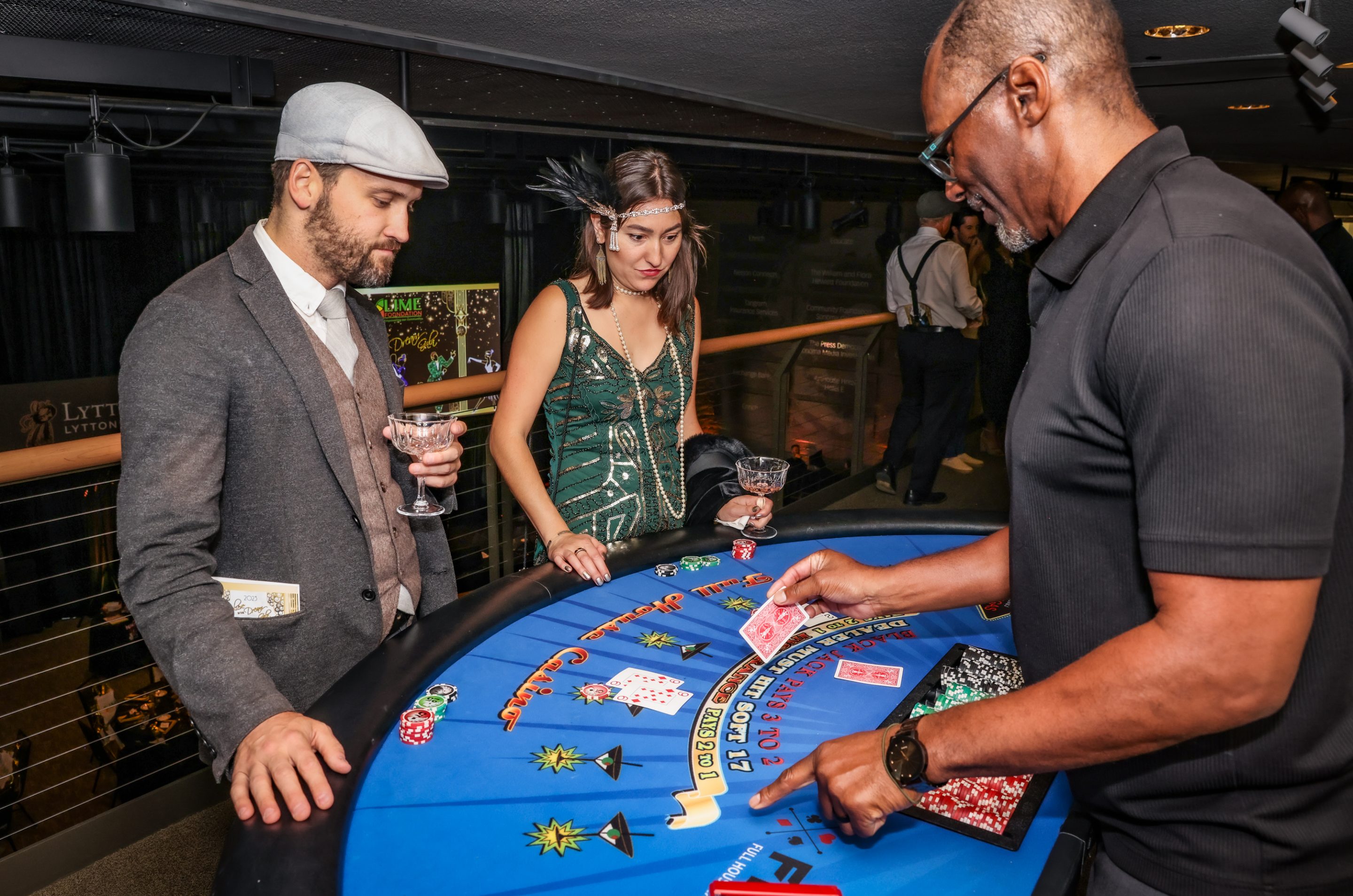 A group of people enjoying a game of roulette at a Santa Rosa non-profit event organized by The LIME Foundation.