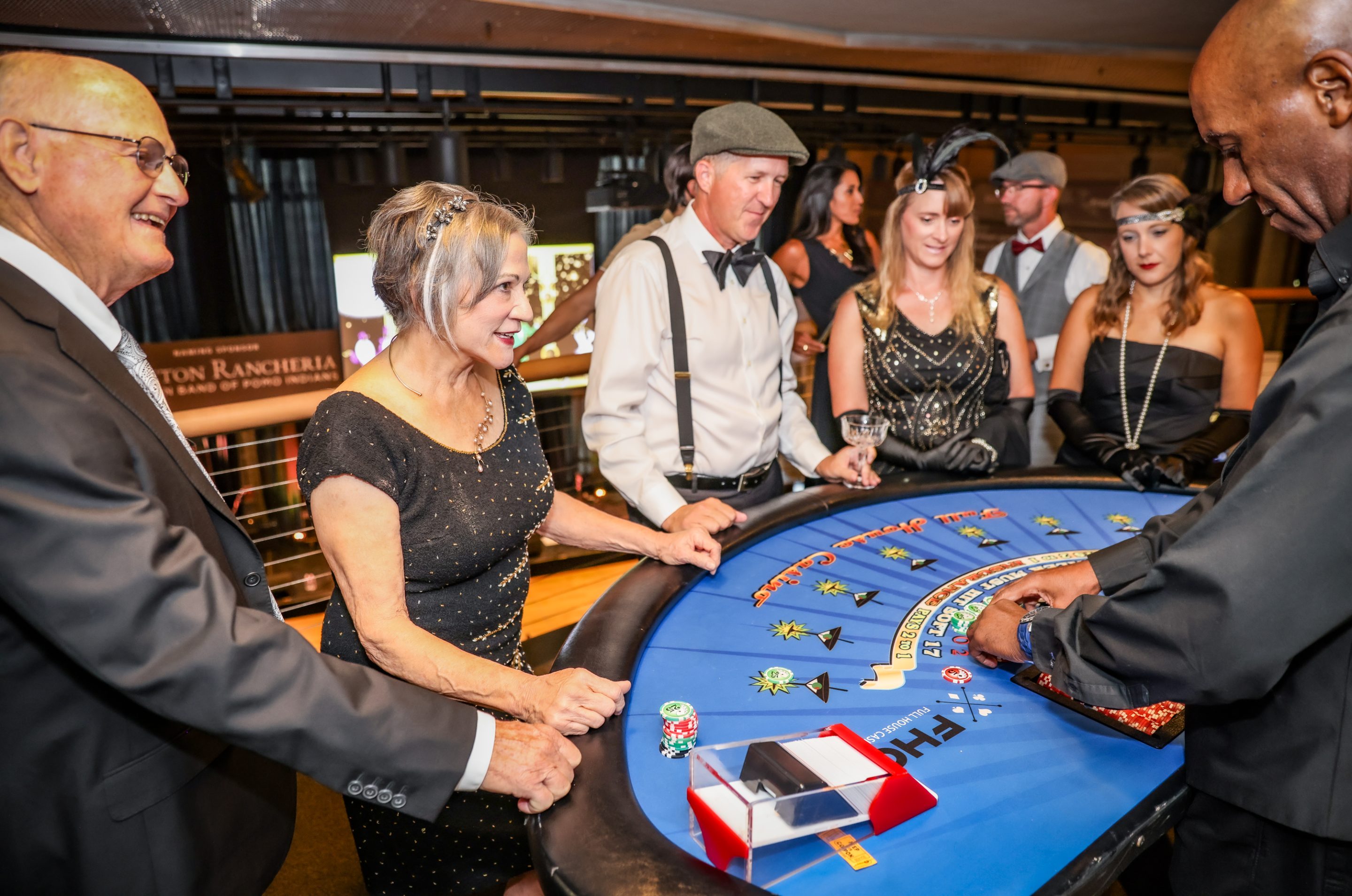 A group of people playing roulette at The LIME Foundation of Santa Rosa.