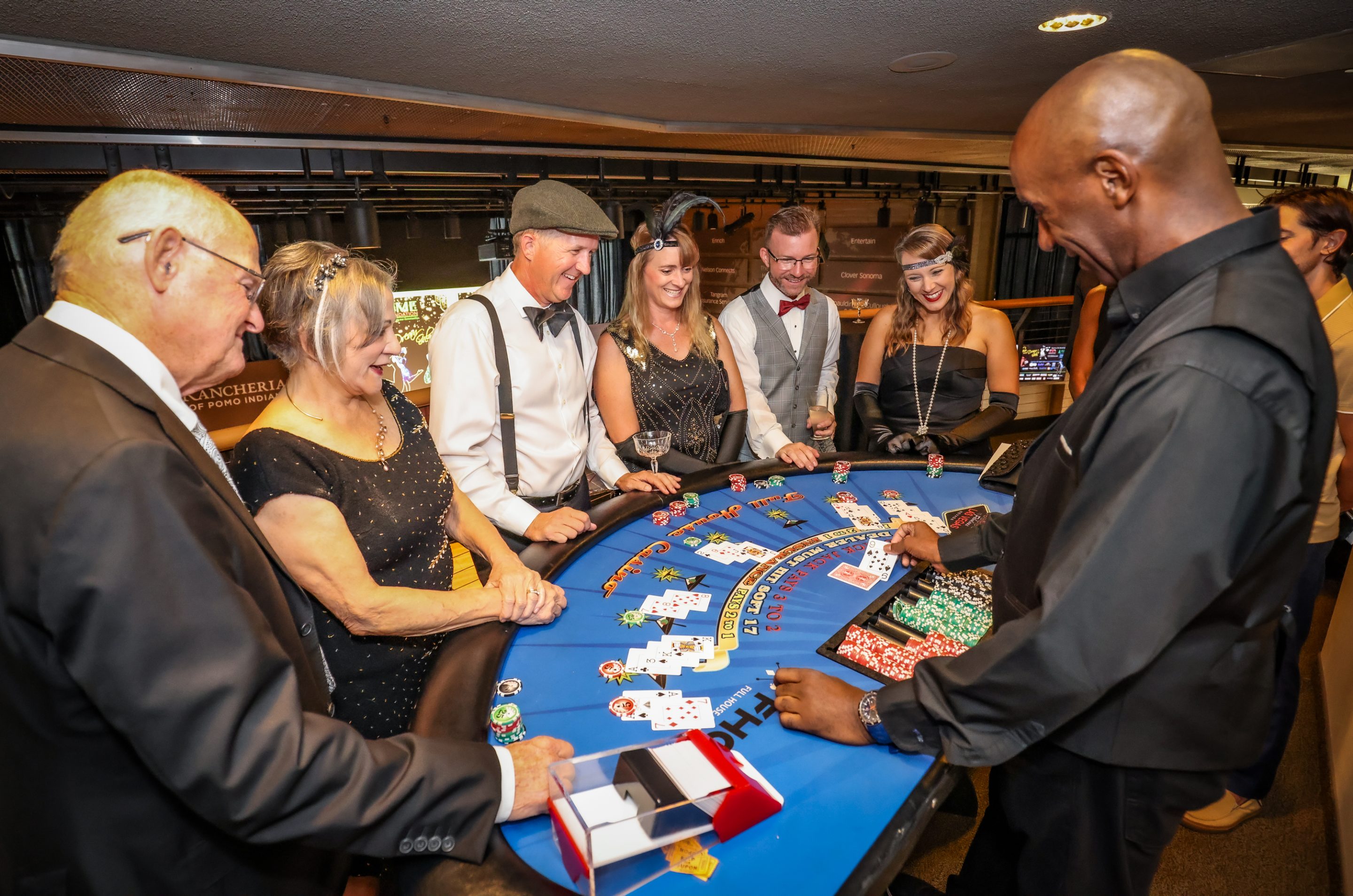 A group of people playing baccarat at a Santa Rosa non-profit event.