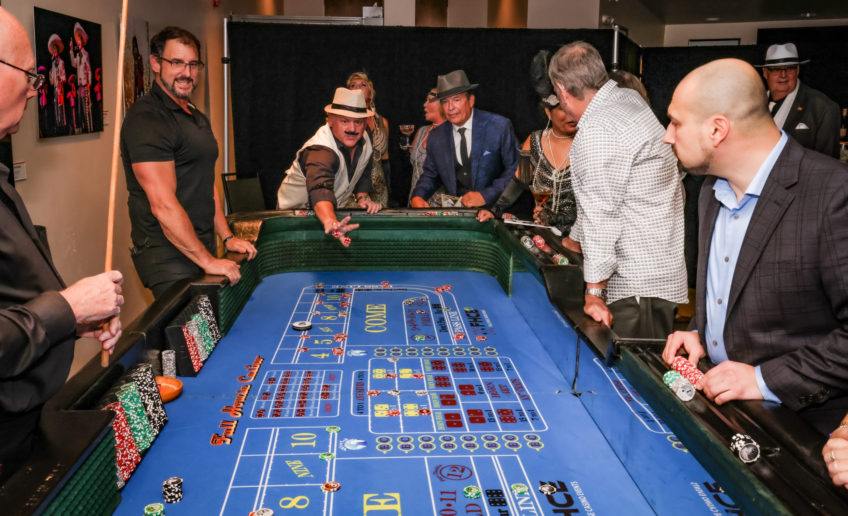 A group of people gathered around a casino table at The LIME Foundation of Santa Rosa.