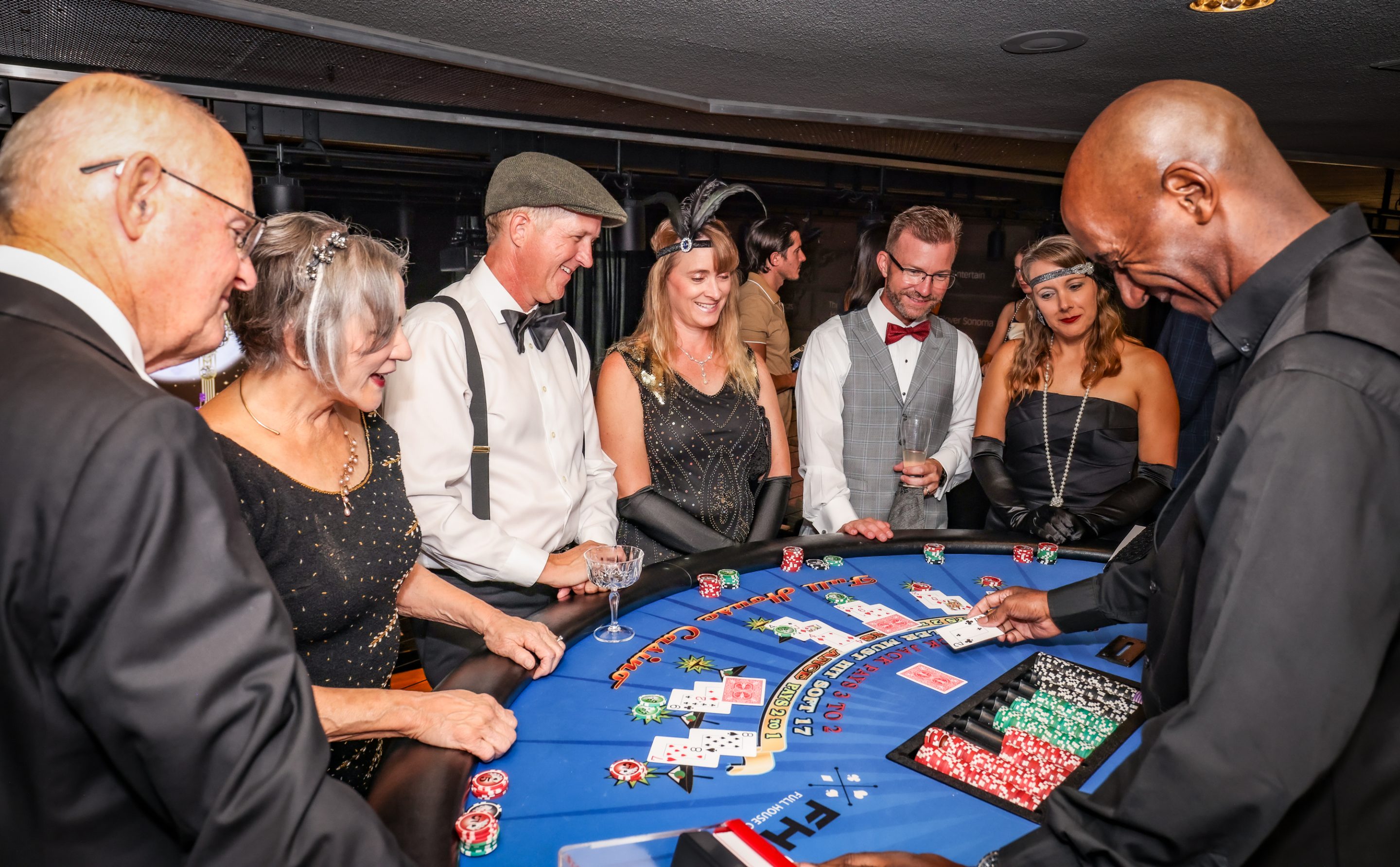 A group of people playing a game of roulette organized by The LIME Foundation of Santa Rosa.