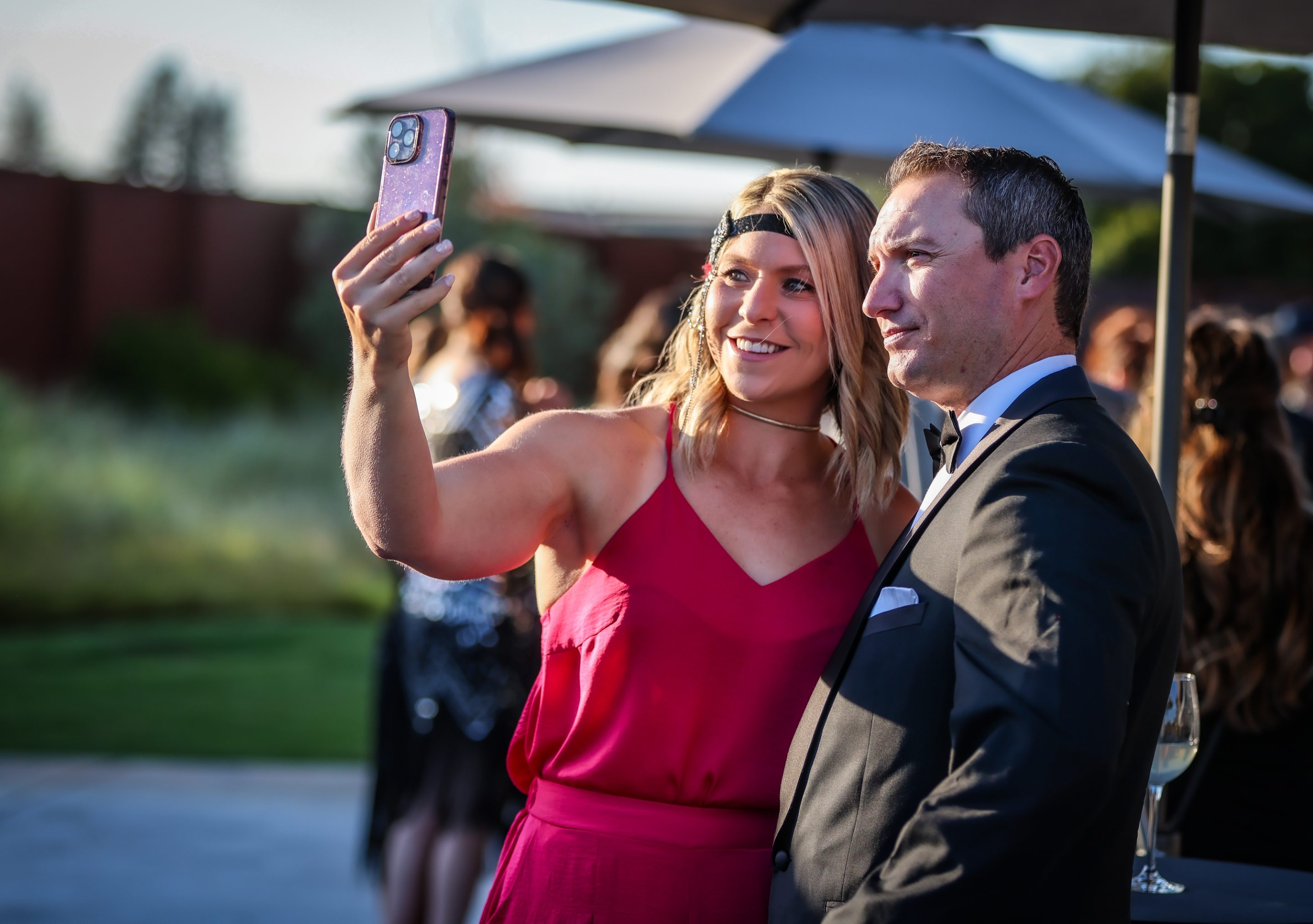 A man and woman taking a selfie at an outdoor event hosted by The LIME Foundation in Sonoma County.