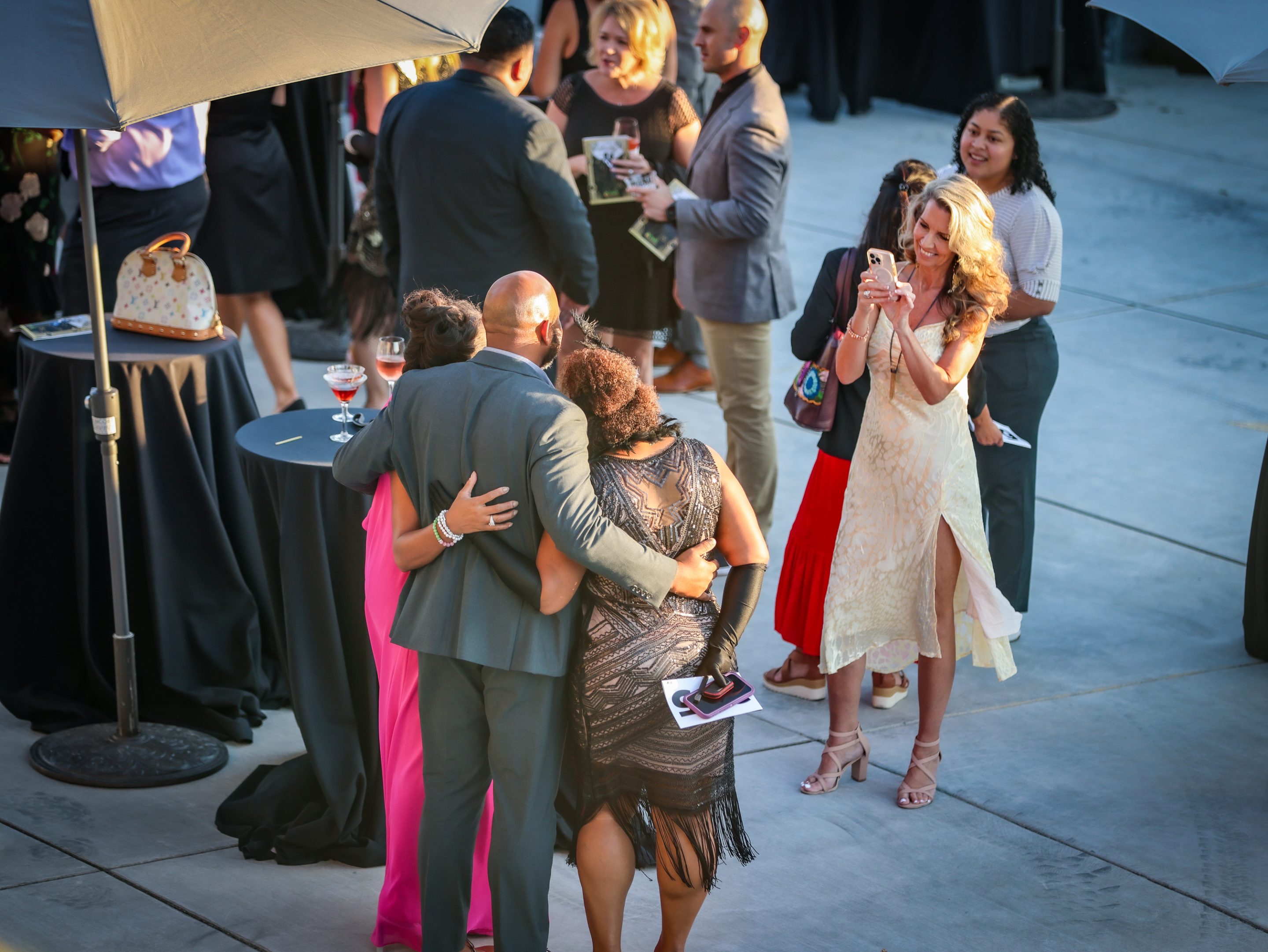 A group of people hugging at The LIME Foundation, a Sonoma County non-profit organization.