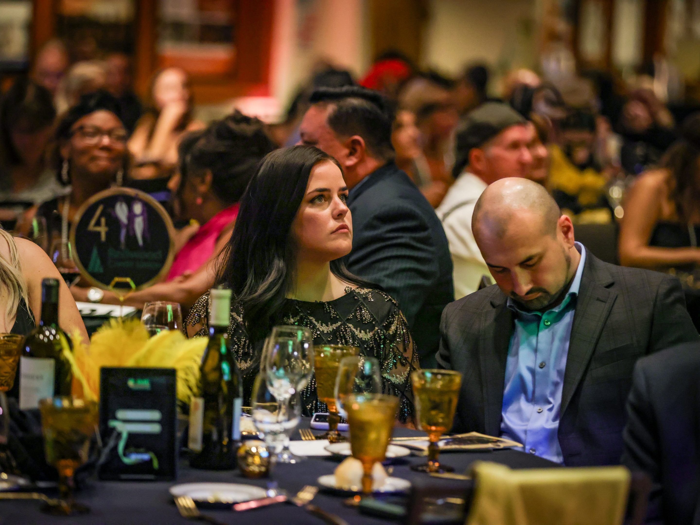 A group of people seated at a table at an event hosted by The LIME Foundation of Santa Rosa.