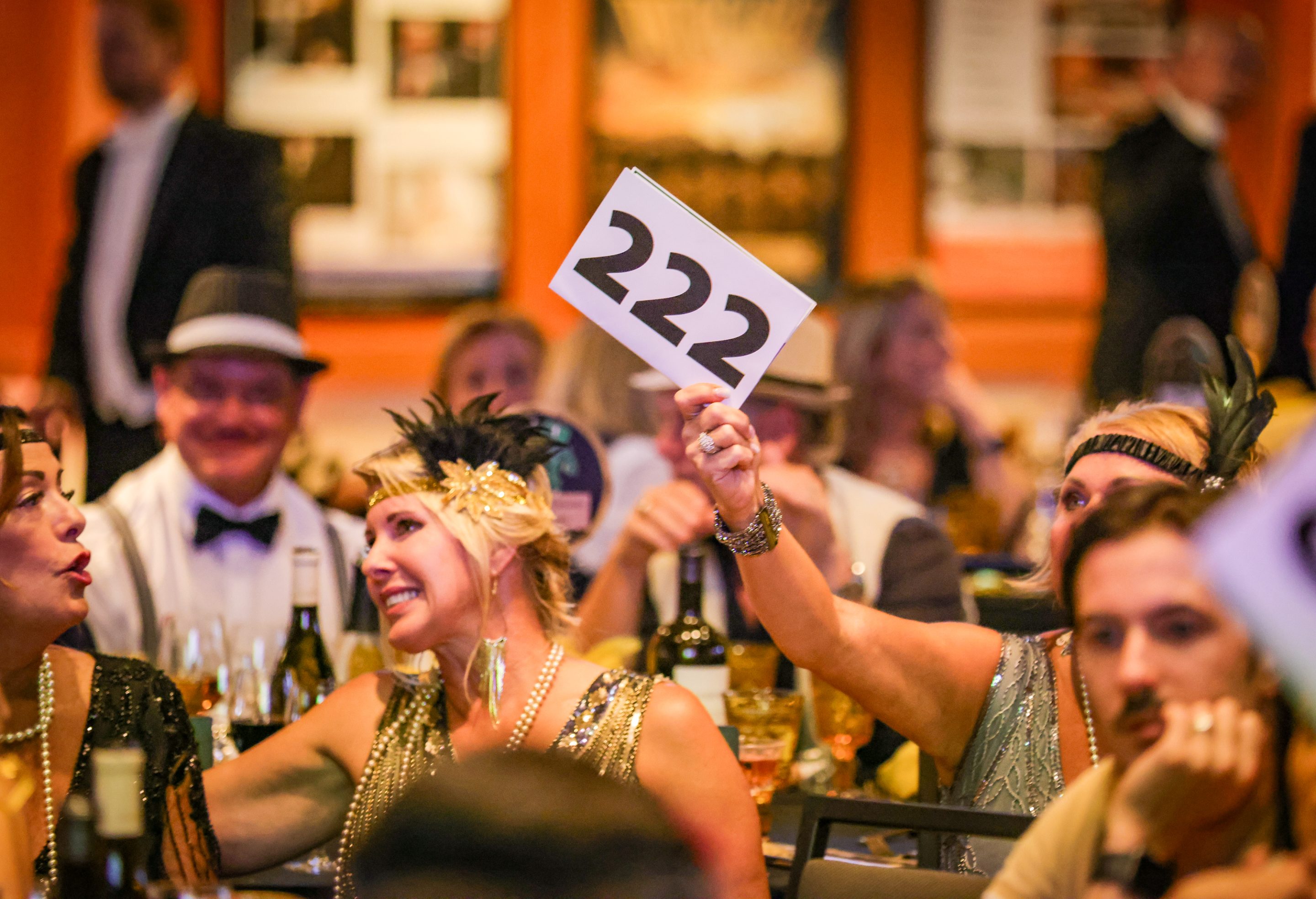 A group of people at a Gatsby themed dinner hosted by The LIME Foundation of Santa Rosa, a Sonoma County Non-Profit Organization.