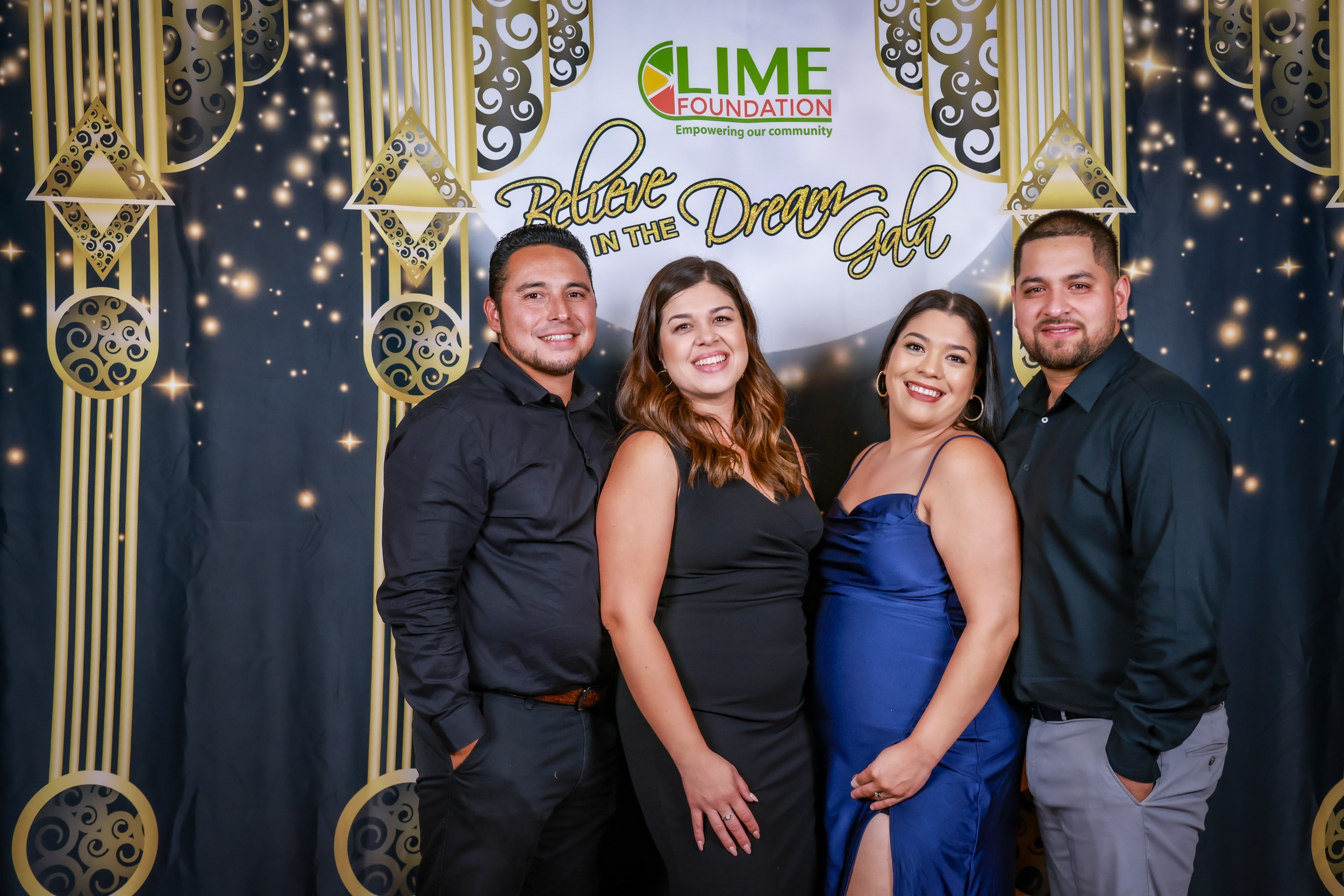 A group of people posing for a photo at a party hosted by LIME Foundation in Sonoma County.