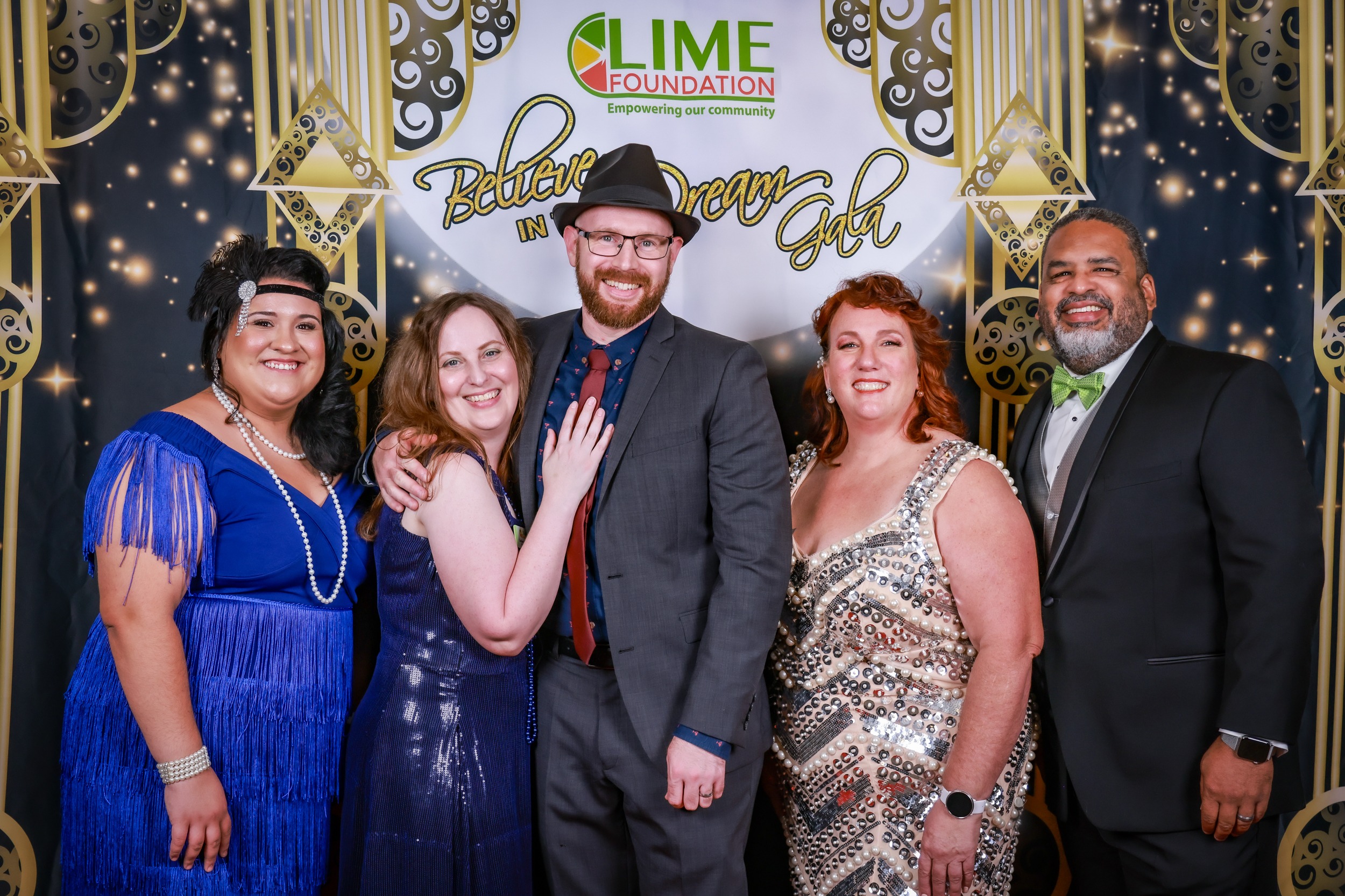 A group of people posing for a photo at a Sonoma County event hosted by The LIME Foundation.