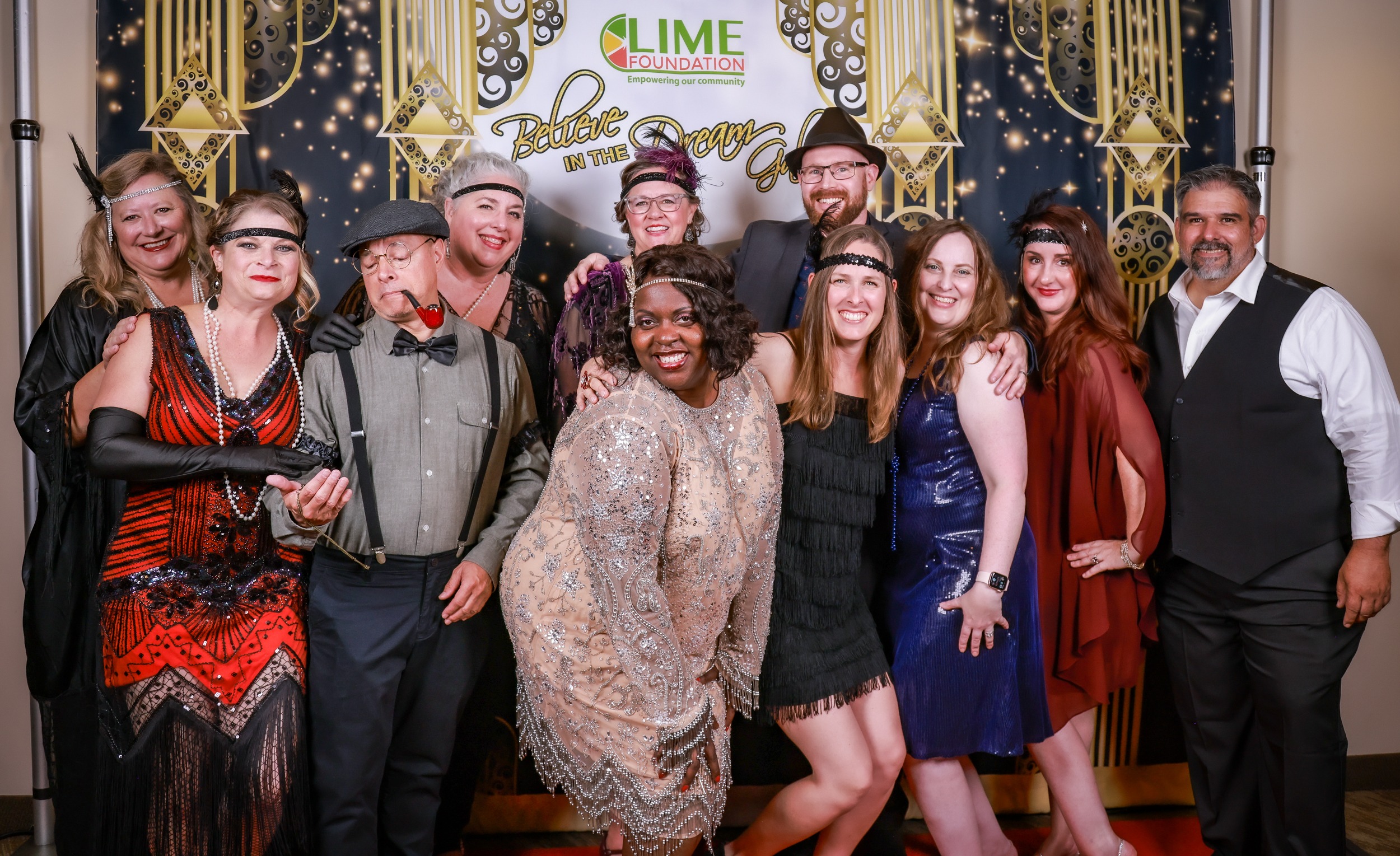 A group of people from The LIME Foundation posing for a photo on a red carpet in Santa Rosa.