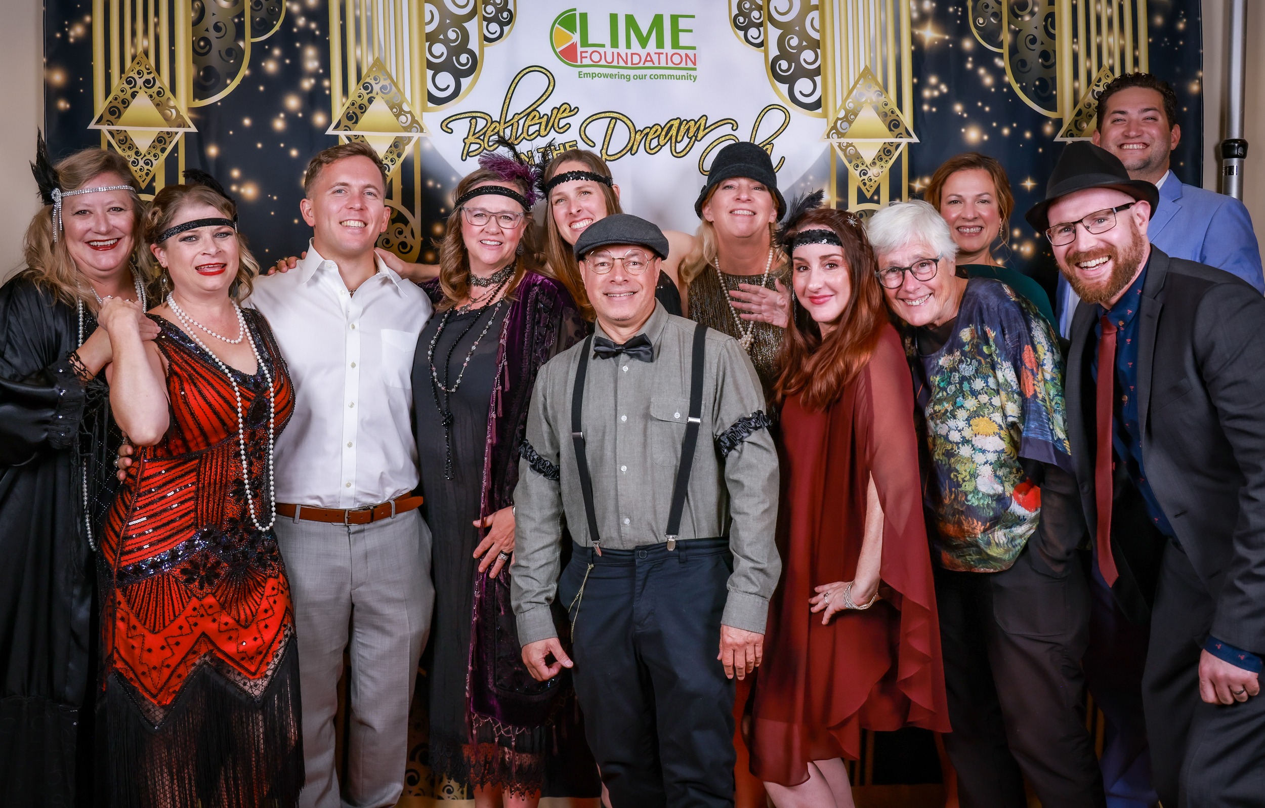 A group of people posing for a photo at a Sonoma County non-profit organization event.