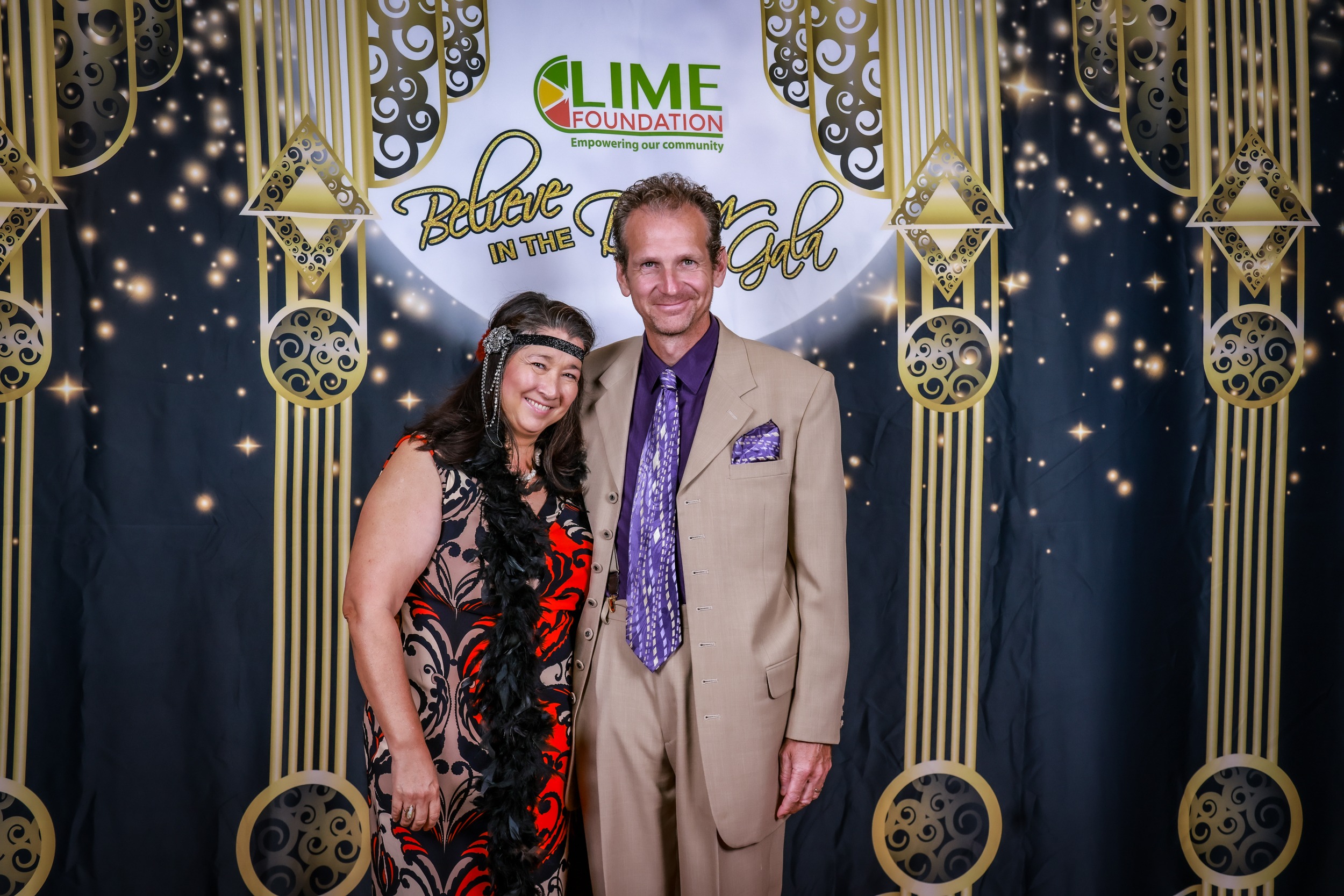 A man and woman posing for a photo at The LIME Foundation of Santa Rosa.