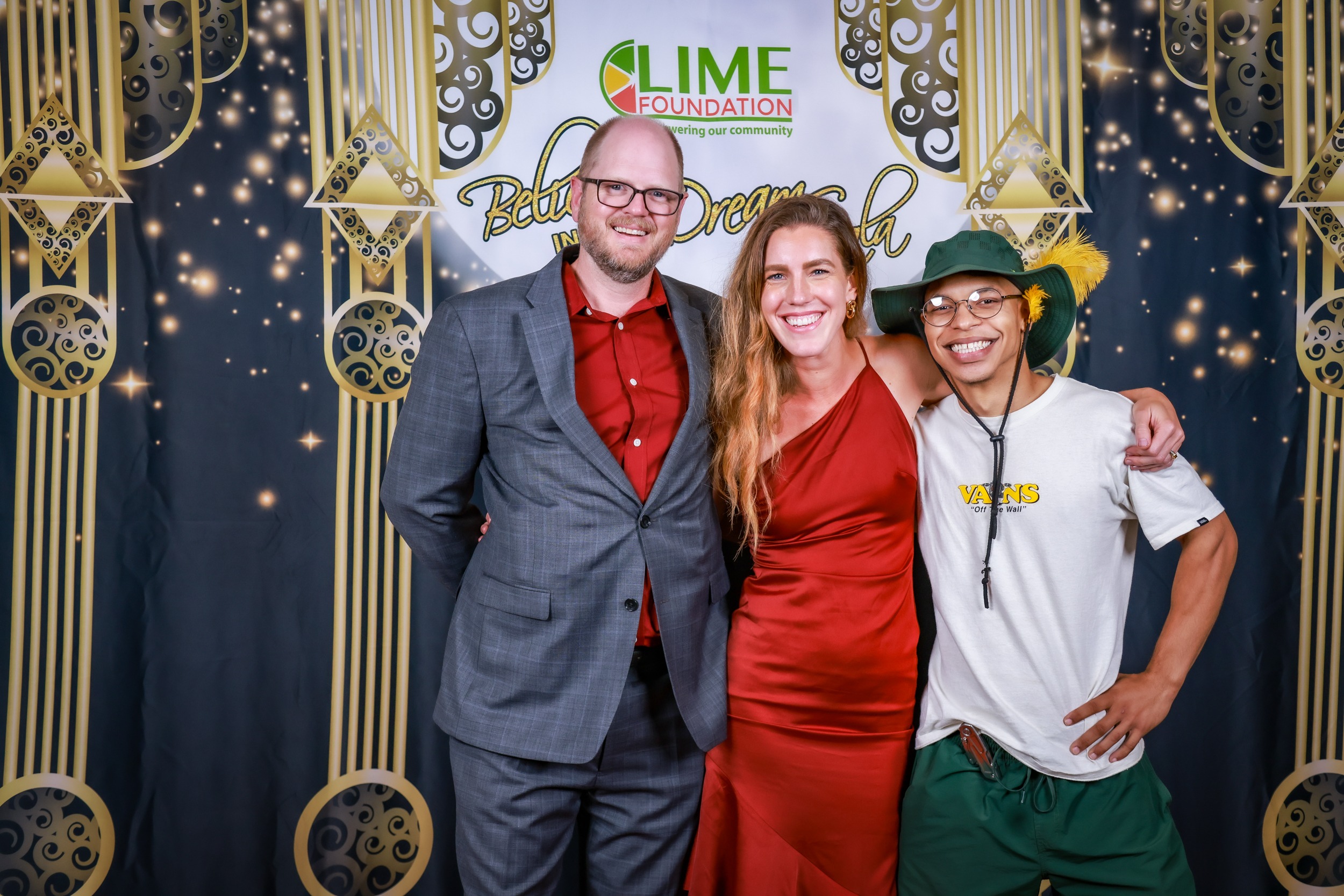 Three people posing for a photo at The LIME Foundation of Santa Rosa event.