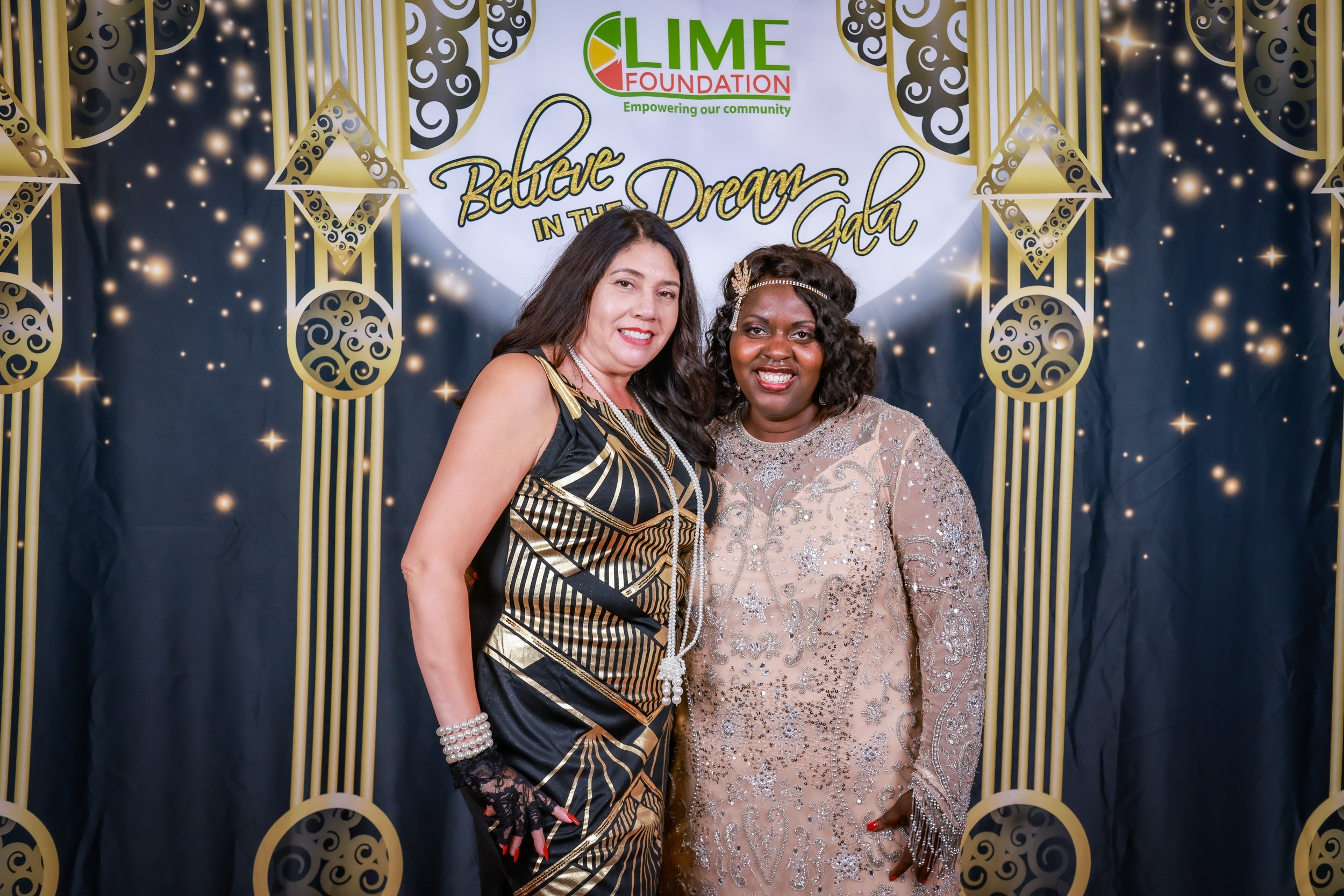 Two women posing for a photo at an event hosted by The LIME Foundation of Santa Rosa.