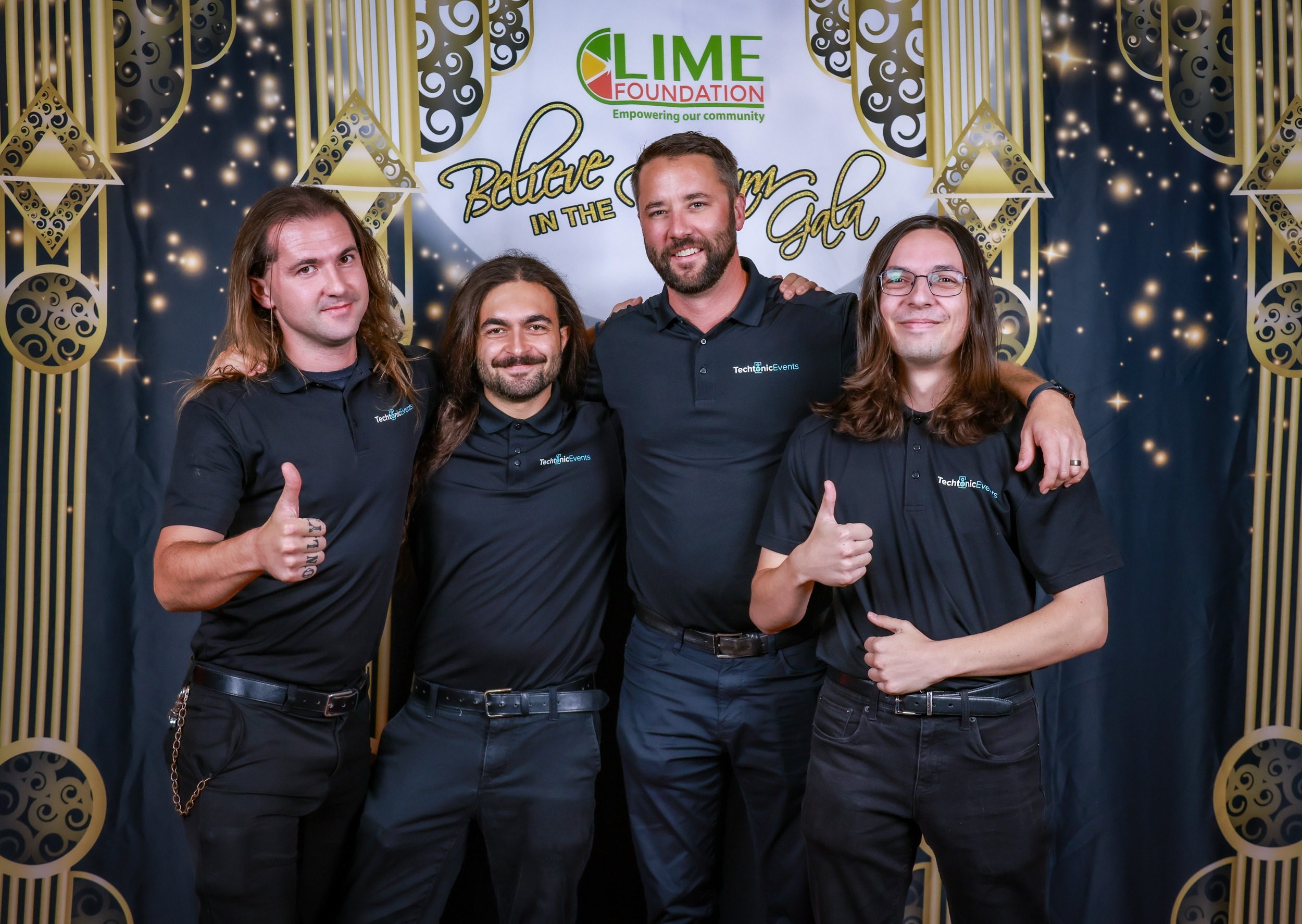 Four men in black shirts posing for a picture at The LIME Foundation of Santa Rosa.