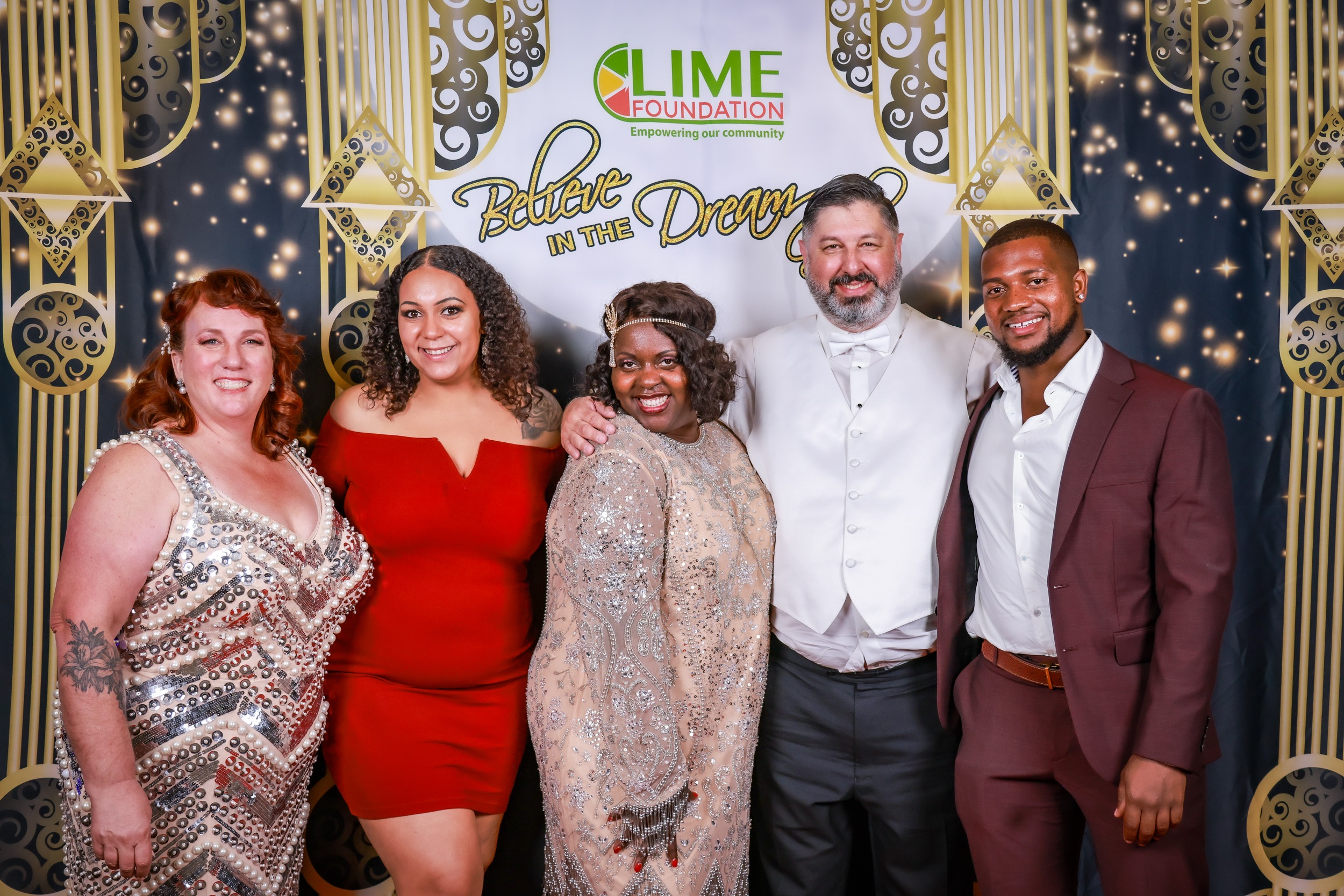 A group of people posing for a photo at an event hosted by The LIME Foundation of Santa Rosa.