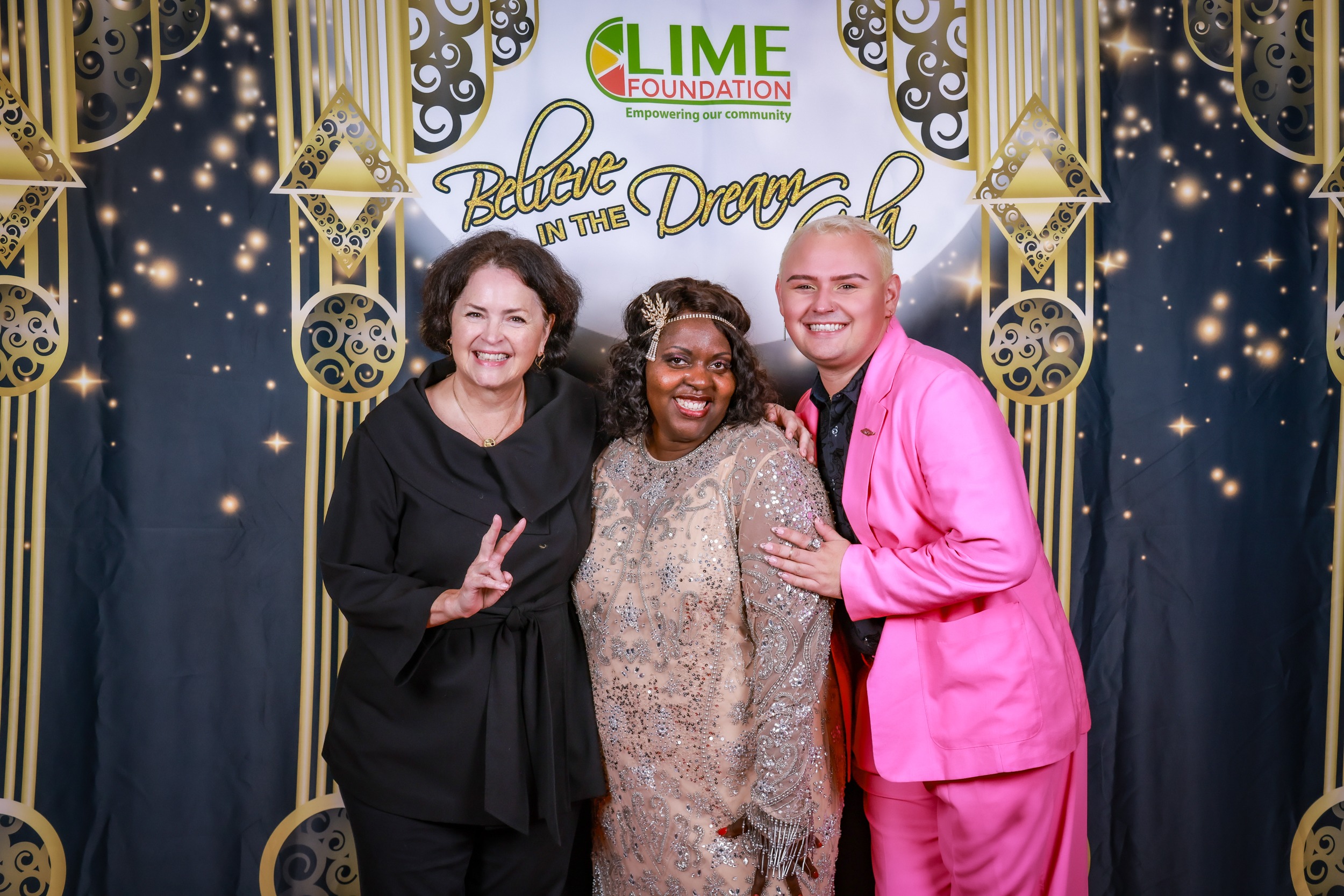 Three women posing for a photo at an event hosted by The LIME Foundation of Santa Rosa.