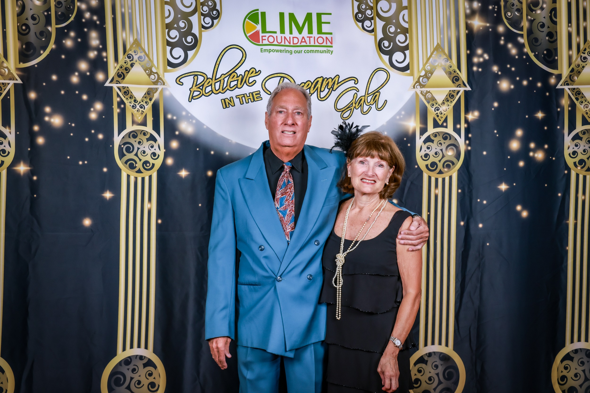 A man and woman posing for a photo at The LIME Foundation of Santa Rosa event.