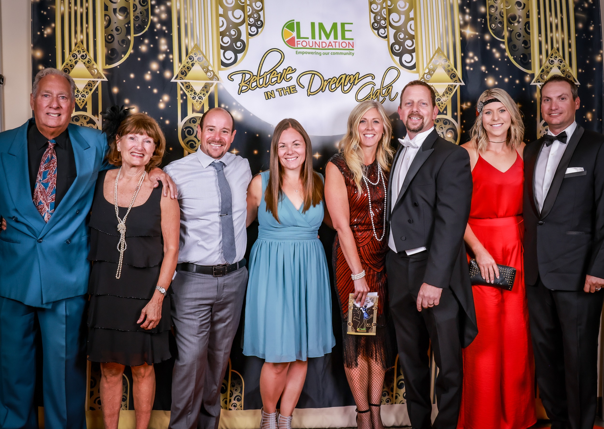 A group of people, including members from The LIME Foundation of Santa Rosa, posing for a photo at an awards ceremony.