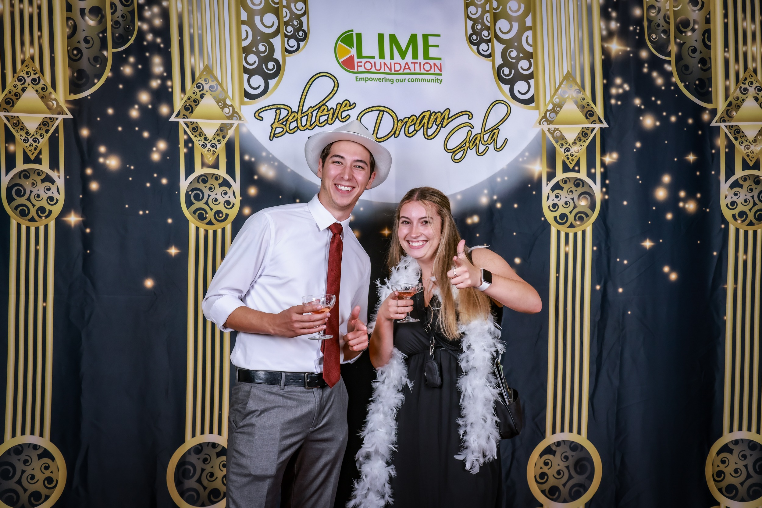 Two individuals posing for a photo at a party hosted by The LIME Foundation of Santa Rosa.